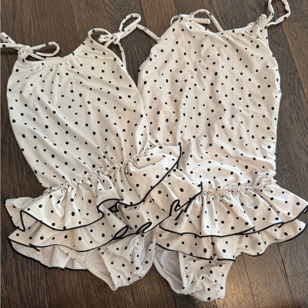 Subclass ruffle swimsuit size 4 and size 8 
Perfect condition